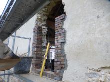 Création d'une baie dans un vieux mur .