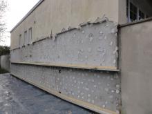 Mur avec une ancienne isolation de 80mm détériorée