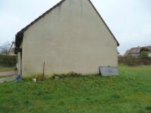 Percement dans le pignon pour de nouvelles ouvertures, isolation des murs par l'extérieur et bardage bois Douglas. (Avant)