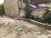 Muret pour jardinières , le mur à l'arrière sera aussi rénové.